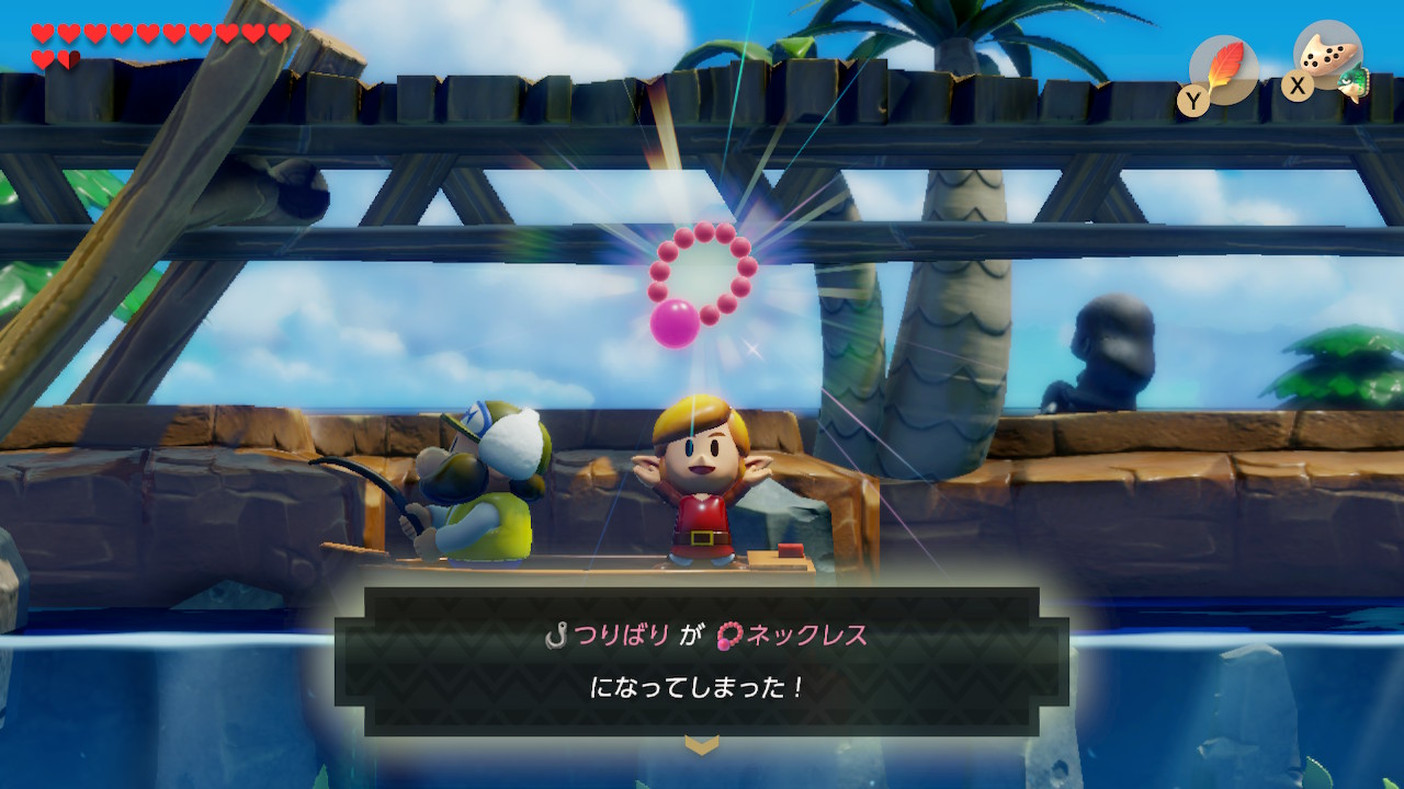 Link receiving the mermaid's necklace in the Japanese version of Link's Awakening on the Switch.